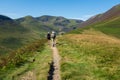 Couple hiking in the Lake District. Royalty Free Stock Photo