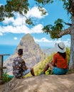 couple hiking in mountains Saint Lucia Caribbean, nature trail in jungle with view of huge Pitons Royalty Free Stock Photo