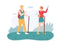 Couple hiking on nature with walking sticks. Man and woman with equipment and backpacks having journey
