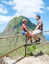 Couple hiking in Saint Lucia Caribbean, nature trail in the jungle of Saint Lucia huge Pitons Royalty Free Stock Photo