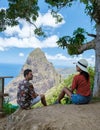 Couple hiking in Saint Lucia Caribbean, nature trail in the jungle of Saint Lucia huge Pitons Royalty Free Stock Photo