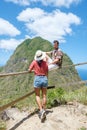 Couple hiking in Saint Lucia Caribbean, nature trail in the jungle of Saint Lucia huge Pitons Royalty Free Stock Photo