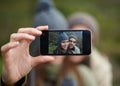 Couple, hiking and smartphone for selfie in nature, camera and capture moment in outdoors. People, happy and picture for Royalty Free Stock Photo