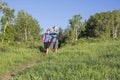 Couple hiking together on a mountain trail Royalty Free Stock Photo