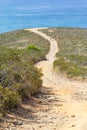 Couple hiking in Trail, mountains and vegetation in Arrifana Royalty Free Stock Photo