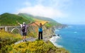 Couple on hiking trip enjoying beautiful summer mountains, coastal landscape, Royalty Free Stock Photo