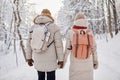 Couple Hiking in Winter With Backpacks Royalty Free Stock Photo