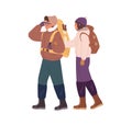 Couple hiking in winter. Man and woman traveling with backpacks in cold weather. Hikers in warm clothes walking together