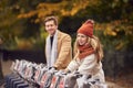 Couple Hiring Bikes As Green Form Of Transport To Get Around City In Autumn Or Fall