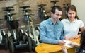 Couple hiring segways ot rental store