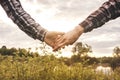 Couple hold hands each other. Hands close-up. Royalty Free Stock Photo