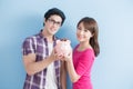 Couple hold pink piggy bank Royalty Free Stock Photo