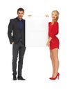 Couple holding big blank board Royalty Free Stock Photo