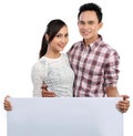 Couple holding blank banner on white Royalty Free Stock Photo