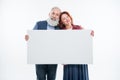 Couple holding blank card Royalty Free Stock Photo