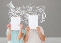 Couple holding blank placard against data graphs in background Royalty Free Stock Photo