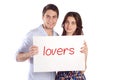 Couple holding cardboard with Royalty Free Stock Photo