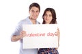 Couple holding cardboard with word Royalty Free Stock Photo