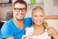 Couple holding energy saving bulb