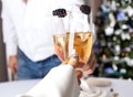 Couple holding glasses of champagne making a toast. Royalty Free Stock Photo