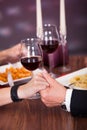 Couple Holding Hand At Restaurant Royalty Free Stock Photo