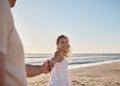 Couple holding hands on the beach and walking together for outdoor wellness, summer holiday and vacation by the sea Royalty Free Stock Photo