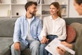 couple holding hands celebrating success of session at psychologist's office Royalty Free Stock Photo