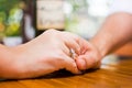 Couple holding hands on a date Royalty Free Stock Photo