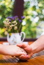 Couple holding hands on a date Royalty Free Stock Photo