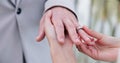 Couple, holding hands and ring for marriage, wedding or ceremony for commitment, love or support. Closeup of people Royalty Free Stock Photo