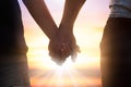 couple holding hands on sunset Royalty Free Stock Photo