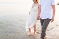 Couple holding hands walking romantic on beach on vacation travel holidays Royalty Free Stock Photo