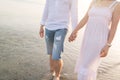 Couple holding hands walking romantic on beach on vacation travel holidays Royalty Free Stock Photo