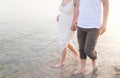 Couple holding hands walking romantic on beach on vacation travel holidays Royalty Free Stock Photo