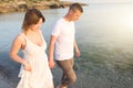 Couple holding hands walking romantic on beach on vacation travel holidays Royalty Free Stock Photo