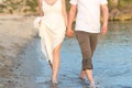 Couple holding hands walking romantic on beach on vacation travel holidays Royalty Free Stock Photo
