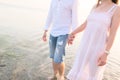 Couple holding hands walking romantic on beach on vacation travel holidays Royalty Free Stock Photo