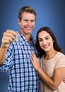 Couple Holding key in front of vignette Royalty Free Stock Photo