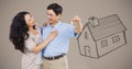 Couple Holding key with house drawing in front of vignette Royalty Free Stock Photo