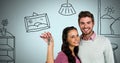 Couple Holding key with house home drawings in front of vignette Royalty Free Stock Photo