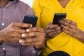 Couple Holding Mobile Phones In Hand Royalty Free Stock Photo