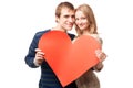 Couple holding sign in form of red heart Royalty Free Stock Photo