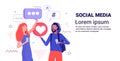 Couple holding social media icons network chat bubble communication concept man woman using online chatting app standing Royalty Free Stock Photo
