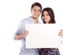 Couple holding white cardboard. Royalty Free Stock Photo