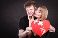 Couple holds broken heart joined in one Royalty Free Stock Photo