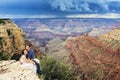 A couple on a honeymoon road trip at Grand Canyon