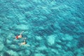 Couple in honeymoon snorkeling in crystal clear sea water Royalty Free Stock Photo