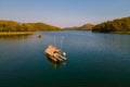 Couple at Huai Krathing lake in North Eastern Thailand Isaan , famous for its floating bamboo rafts Royalty Free Stock Photo