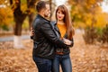 Couple hug in autumn park near river Royalty Free Stock Photo