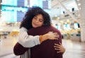 Couple, hug and embracing goodbye at airport for travel, trip or flight in farewell for long distance relationship. Man Royalty Free Stock Photo